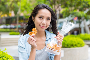 Woman holding Palmier