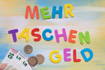 colorful letters and euro currency, german word