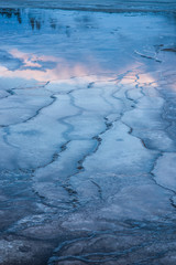 Volcanic Structures and Boardwalk of Grand Prismatic Spring During Sunset and Blue Hour in Yellowstone National Park, Wyoming