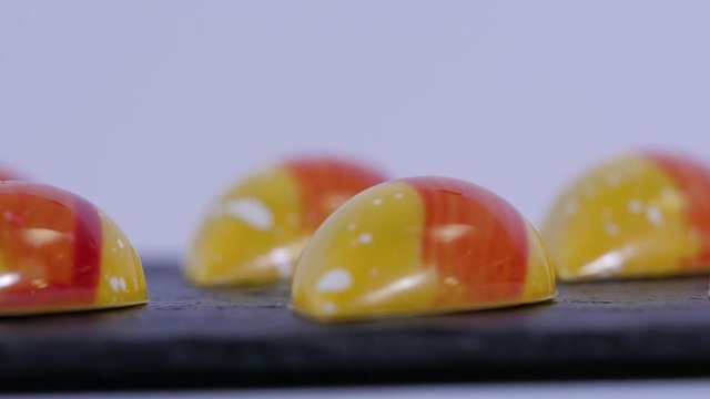 shiny caramel candies. Caramel candies. Row of color caramel candies isolated on a white background.