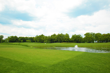 Fototapeta premium Landscape with big golf course on summer day