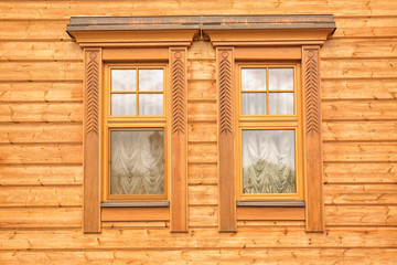 Windows of modern wooden building