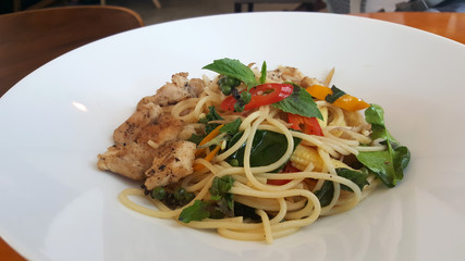 Black pepper chicken breast meat with spaghetti