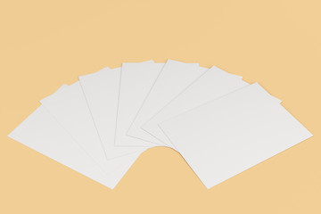 Blank white flyer mockup on orange background