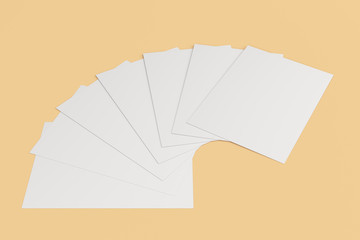 Blank white flyer mockup on orange background