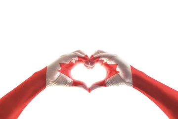 Fotobehang Canada flag pattern on people hands in heart shape for national public holiday celebration concept (isolated with clipping path) © Chinnapong