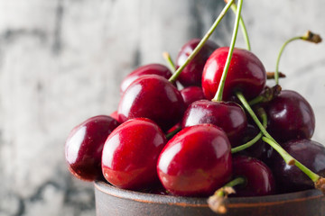 Red fresh cherry in cup