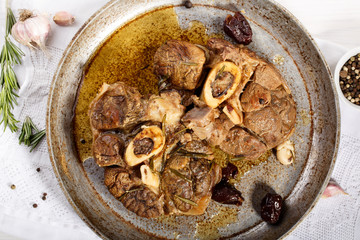 Ossobuco. Braised cross-cut beef shanks.