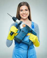 Smiling woman builder holding big puncher.