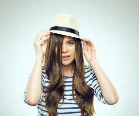 Young woman wearing hat isolated face portrait.