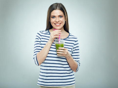 Young woman drinking smoothie drink.