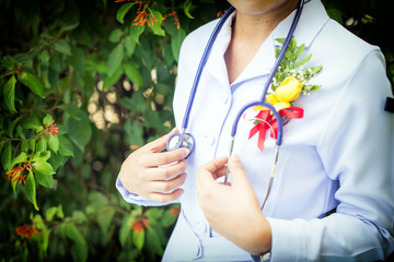 nurse and stethoscope in the garden