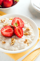 Oatmeal Porridge with Strawberries and Walnuts