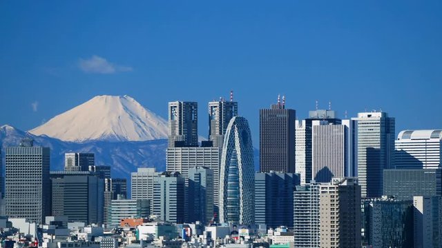 4K 東京タイムラプス　東京定番風景　くっきり見える富士山と大都会の街並　新宿高層ビル群 パン
