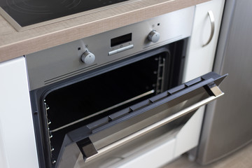 close up of electric oven in kitchen - obrazy, fototapety, plakaty
