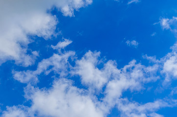 White clouds in deep blue sky