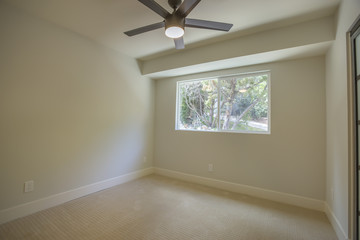Empty bedroom in a model home in southern California