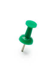 close up of a pushpin on white background
