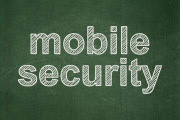 Obraz premium Protection concept: Mobile Security on chalkboard background