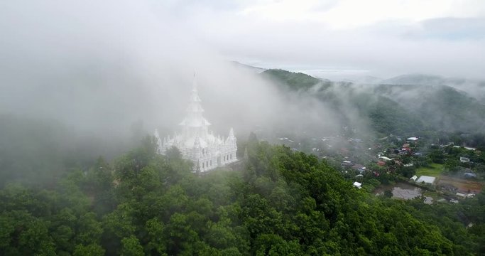Aerial view, Wat Phra That Ban Pong and the foggy morning in Chiang mai, Thailand.