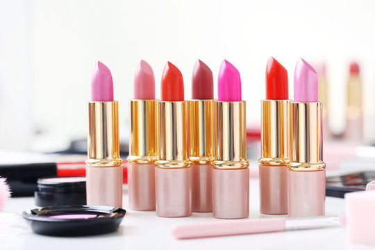 Colourful lipsticks on a white table