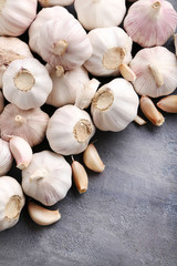 Garlic on the grey wooden table