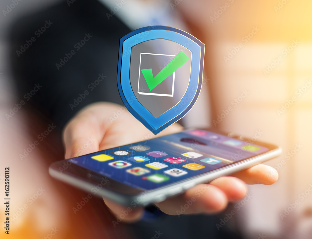 Wall mural shield symbol displayed on a futuristic interface - security and internet concept
