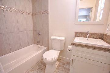 Fototapeta na wymiar Model homes always show off beautiful bathrooms with clever design