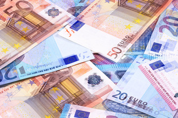 Obraz na płótnie Canvas Euro Money Banknotes of Different denominations abstract background.