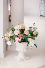 Rich bunch of pink peonies and lilac eustoma roses flowers. Fresh spring bouquet