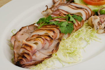Grilled Squid on wood table