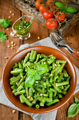 Green beans with pesto and pine nuts