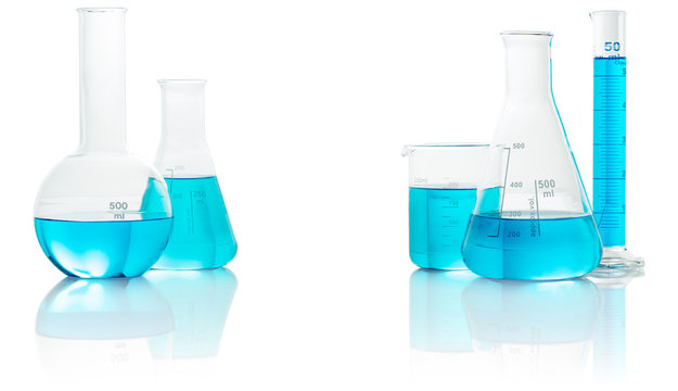 chemical glassware with blue liquid isolated on white