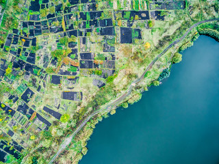 Aerial view - lake shore with pied gardens