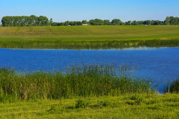Obraz premium A beautiful lake for breeding fish. Magnificent view of the lake.
