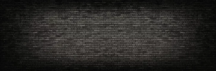 Fotobehang Bakstenen muur Zwarte bakstenen muur panoramische achtergrond.