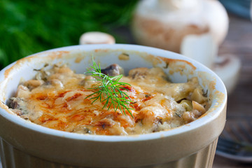 Hot appetizer with champignons and cheese, horizontal