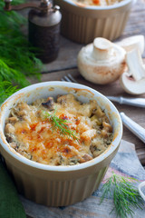 Julienne with champignons, leek and cheese, selective focus
