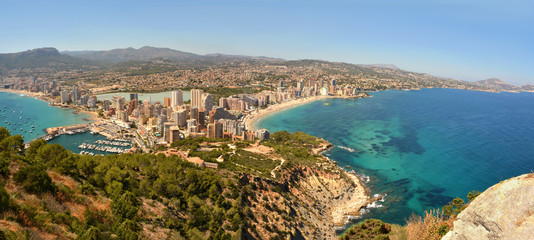 Fototapeta premium Costa Blanca Panorama Panoramic view of Calpe from famous rock - Penon de Ifach, overlooking the coast, the harbor, lake and the city.