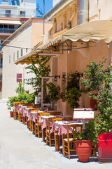 Old streets with restaurants in Chania, Greece