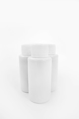White bottles on a white background