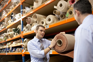 Two businessmen in warehouse