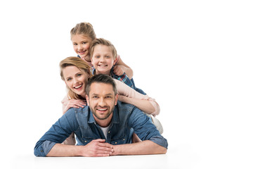 smiling family spending time together isolated on white