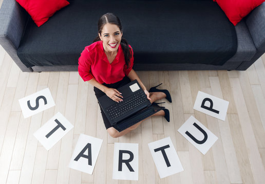 Beautiful Young Businesswoman Using A Laptop, Start Up Concept