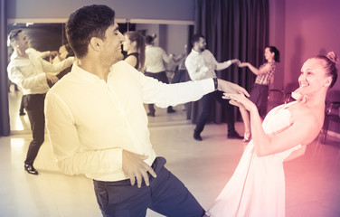 People practicing twist movements