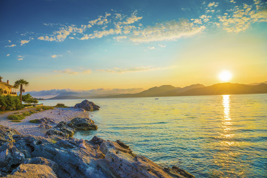 Fototapeta Beautiful sunrise over the Ionian sea in Lefkada island beach in Greece