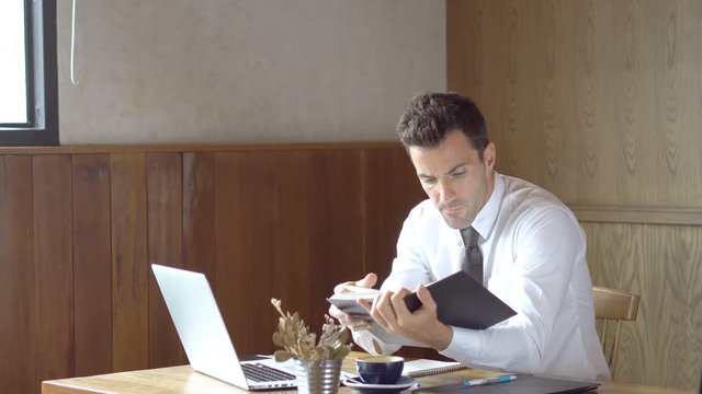 Serious entrepreneur self studying on line. Stock footage