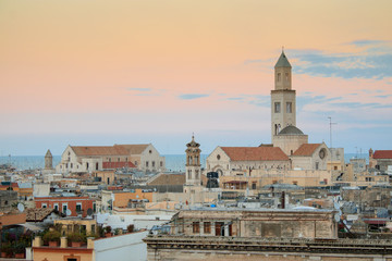  Cityscape of Bari at sunset with Basilica of San Nicola and Romanesque Cathedral. Bari, Italy, Europe