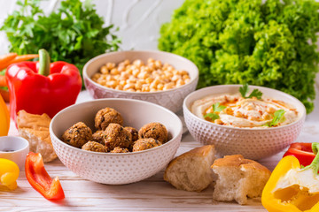 Falafel, pita, hummus and chickpea  with vegetables. horizontal view