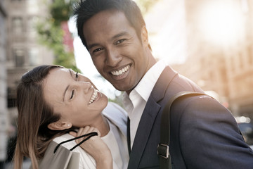 Cheerful couple doing shopping in New York city
